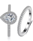 Pear Cut Cubic Zirconia Halo Engagement and Wedding Ring Set - Boutique Pavè