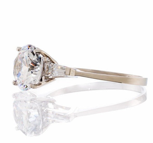 Round Solitaire Baguette Cubic Zirconia Engagement Ring In White Gold Plated Sterling Silver - Boutique Pavè