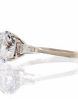 Round Solitaire Baguette Cubic Zirconia Engagement Ring In White Gold Plated Sterling Silver - Boutique Pavè